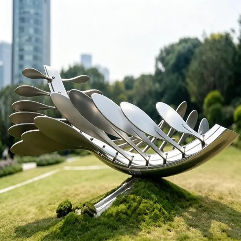 거울 광택 스테인레스 스틸 링 조각품은 어떻게 제작되고 설치됩니까?